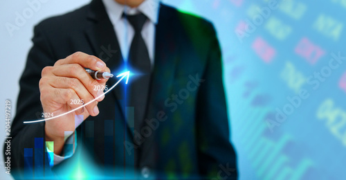 Businessman Drawing Upward Trend Graph