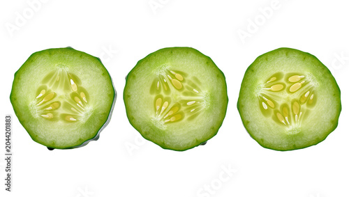 Foto Three fresh cucumber slices with visible seeds and green skin