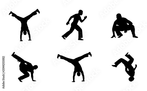 Fotografia Dynamic Breakdancing Silhouettes, Urban Street Dance Poses, Athletic Hip Hop Mov