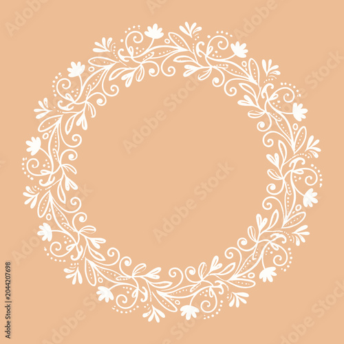A delicate floral wreath illustration on a soft peach background