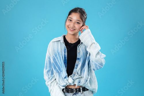 Tablou pe pânză Charming flirtatious millennial female showing joyful friendly expressions