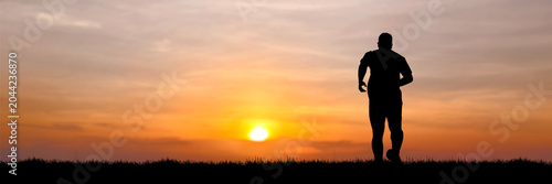 A lone runner silhouetted against a vibrant sunset, embodying dedication and the pursuit of health. The warm hues of the sky create a dramatic backdrop for this moment of personal triumph