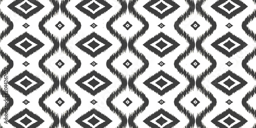 Cuadro en lienzo Black and white ikat tribal geometric seamless pattern with diamond shapes