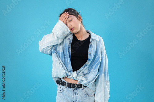 Εκτύπωση καμβά Stressed young woman wiping sweat from forehead feeling sick indoor