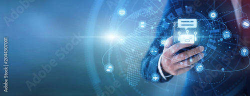 Cuadro en lienzo Support agent using hand hold mobile managing automated Chatbots systems