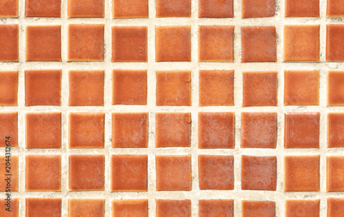 Seamless terracotta tile texture background with orange mosaic square blocks and rustic ceramic grid for interior mockup design