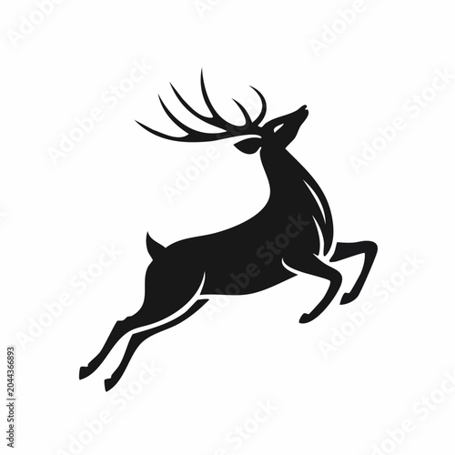 Silhouette of a leaping stag with large antlers