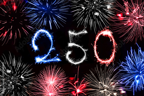 250 written with sparkles and fireworks, US flag colors, america 250th anniversary celebration
