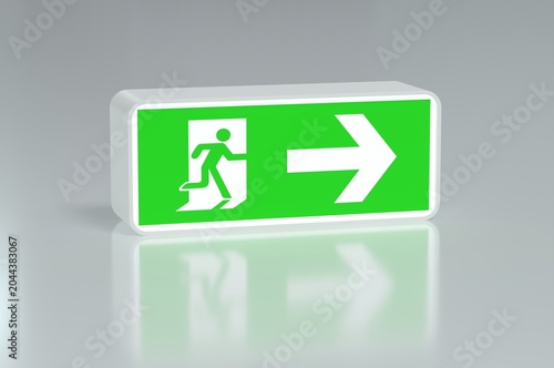 Green emergency exit sign with arrow pointing right on glossy grey background
