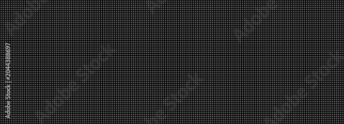 Digital led screen perforated texture banner. Black electronic display pattern background with small white dot mesh for gaming and audio design.