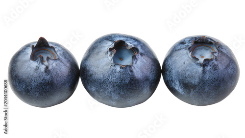 Foto Three ripe blueberries with visible bloom and calyx