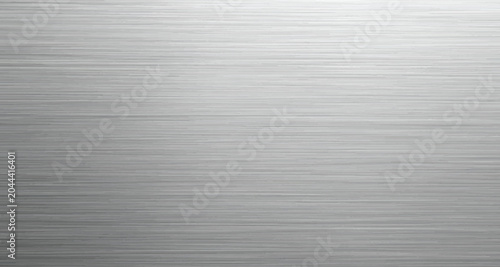 Elegant metallic surface with brushed steel grain and soft reflective highlights creating a sophisticated industrial backdrop.