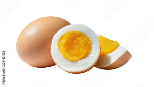 Fotografija Whole and halved hard-boiled eggs with bright yellow yolks