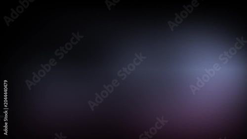 Animation abstract soft gradient light leaks loop motion background on black background. Blurry abstract background with colorful lights.