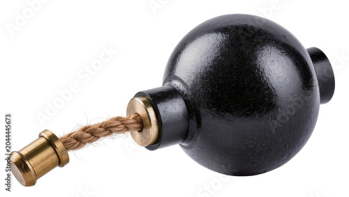 Bild auf Leinwand Black cannonball with brass fuse holder and rope