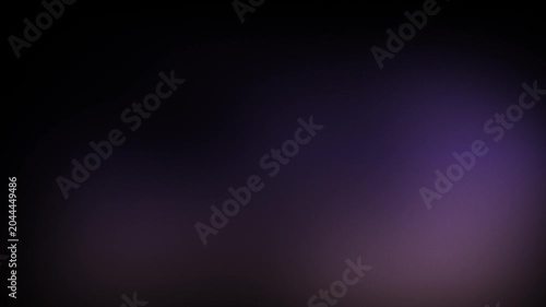 Animation abstract soft gradient light leaks loop motion background on black background. Blurry purple and black abstract background.