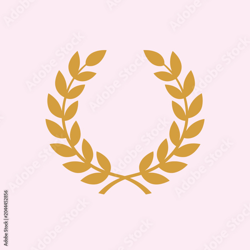A golden wreath illustration on a soft pink background is a simple design