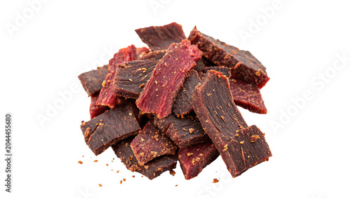 Fotografía Dehydrated cured beef jerky pieces stacked together isolated on transparent back