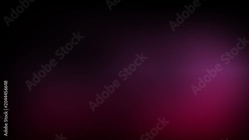 Animation abstract soft gradient light leaks loop motion background on black background. A dark background with a pink glow.