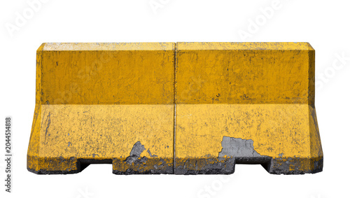 Foto Yellow concrete Jersey barrier with chipped paint and rough texture