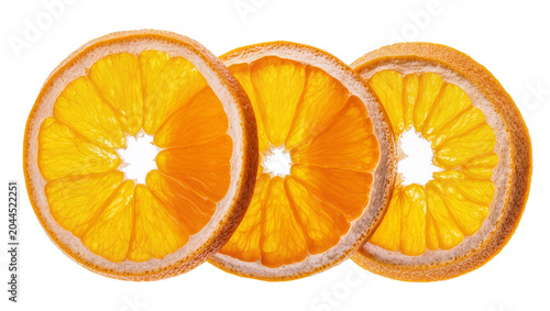 Cuadro en lienzo Three bright orange citrus fruit slices with white pith and textured rind