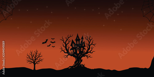 Foto Spooky halloween background with haunted house bats and trees on a gradient oran