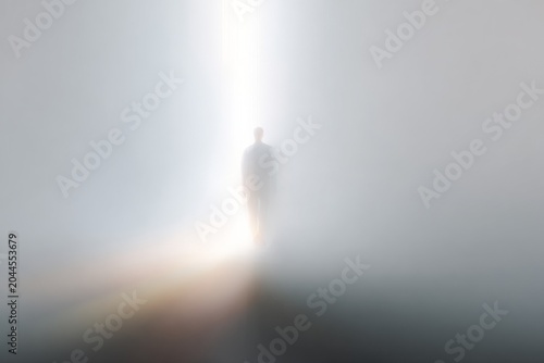 Ascending silhouette in a beam of light with soft fog and radiant glow for spiritual background and inspirational poster design