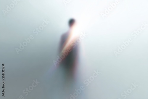 Minimal ascending spirit silhouette in a beam of light for ethereal background and spiritual poster design
