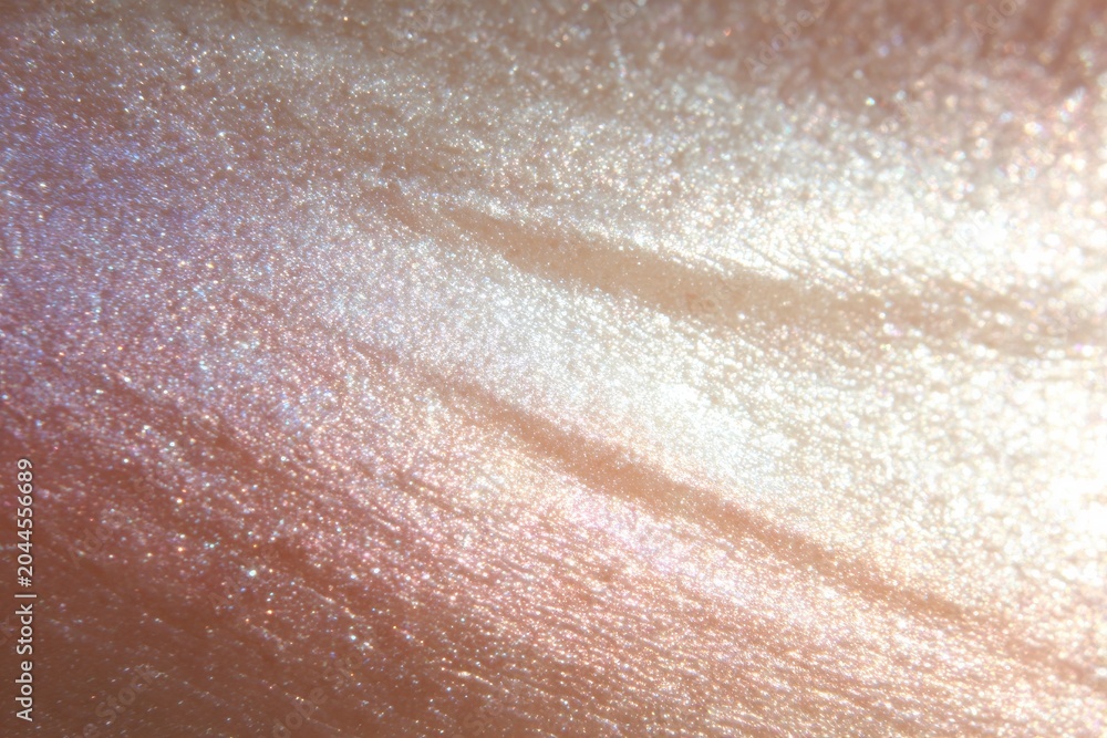 Fototapeta premium Opalescent skin macro texture with iridescent shimmer for beauty background and skincare design