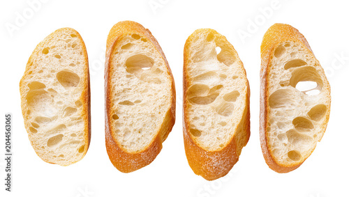 Slika na platnu Four slices of crusty baguette bread with airy crumb