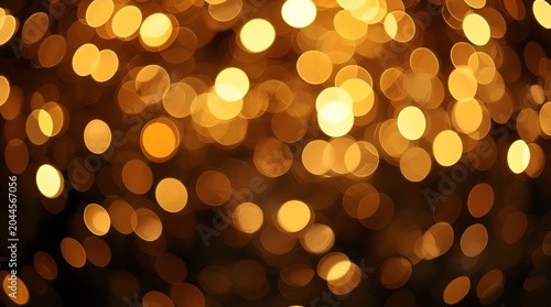 Golden Bokeh Lights Creating Abstract Festive Background.