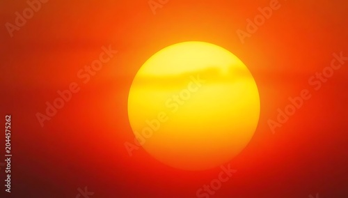 Vibrant Sunset - A Fiery Orb in the Evening Sky.