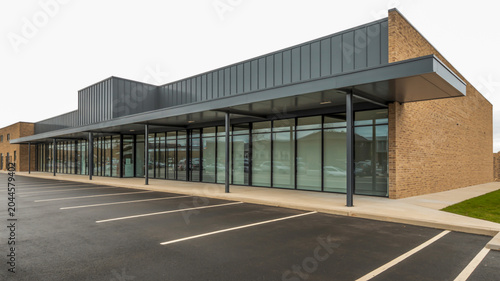 Modern industrial warehouse building with roller shutter doors