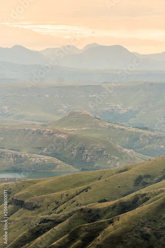 Layered Mountain Ridges Drakensberg South Africa Cloaked In Pastel Haze At Dawn, Distant Peaks Fading Into