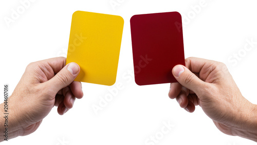 Hands holding yellow and red soccer cards