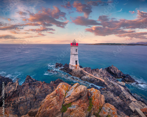 Beautiful marine scenery. Picturesque morning view of di Capo Ferro Lighthose. Amazing summer scene of Sardinia island, Italy, Europe. Splendid  Mediterranean seascape.