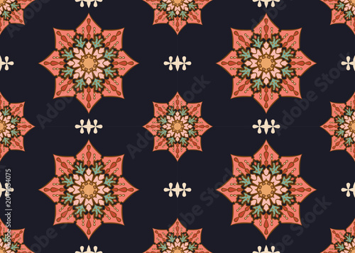 Colorful seamless abstract floral mandala pattern on an indigo background use for fabric, textile, clothing, carpet, wallpaper, backdrop, cloth bag ,home decoration elements.