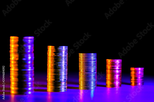 Conceptual Series : Rows of Thai coins glowing in neon RGB cyberpunk lighting serve as a visual metaphor for currency and wealth.
