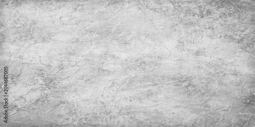 Obraz na płótnie A rough and textured vintage gray cement wall backdrop with a dark, dirty grunge