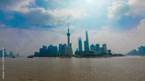 Shanghai Pudong Skyline Across the Huangpu River Under Dramatic Cloudy Sky in Pudong, Shanghai, China