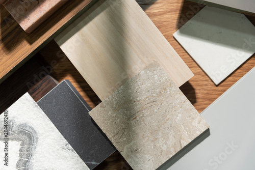 Interior Design Material Mood Board with Natural Wood, Stone, and Marble Samples