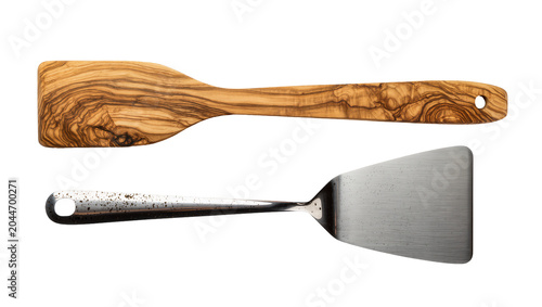 Cuadro en lienzo Wooden olive wood spatula and metal flipper kitchen utensils