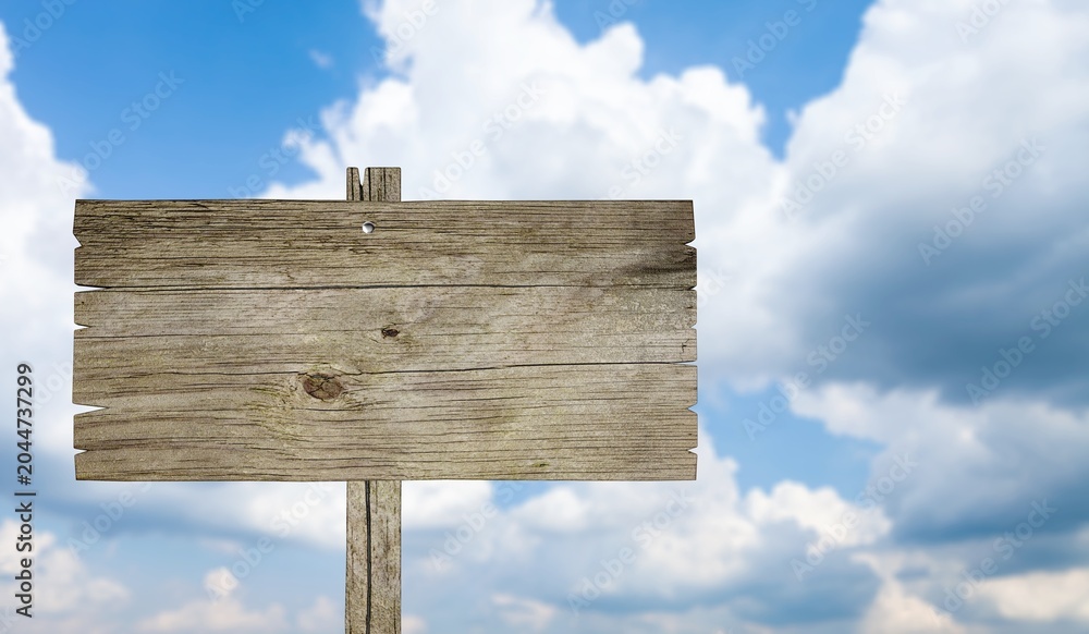 Fototapeta premium Blank wooden sign standing outdoors against a bright blue sky with white clouds background