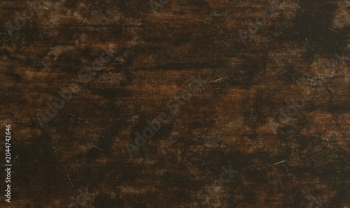 Photos A dark brown wooden surface with visible scratches and marks