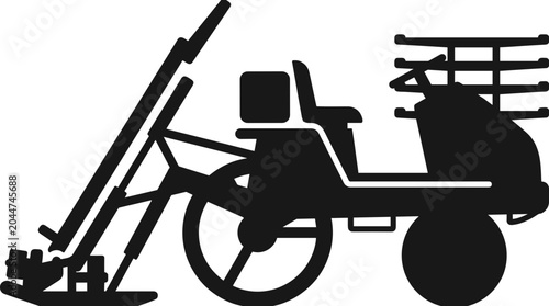 Silhouette of a vintage agricultural harvesting machine.