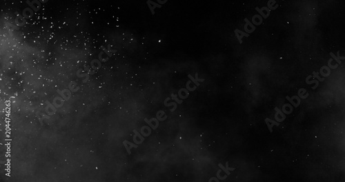 Realistic snowstorm particles and drifting snowflakes isolated on black background. Atmospheric winter weather effect ideal for overlays, visual effects, compositing and cinematic scenes.