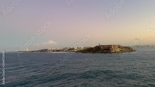 A view of Puerto Rico from the ocean while cruising during the evening sunset.