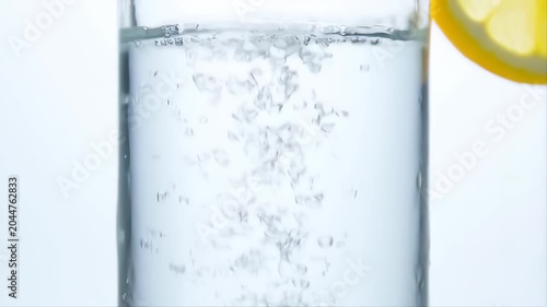 Lemon in Water with Bubbles and Sparkles Featuring Fresh, Citrus, Drink with Beverage and Clear Elements for Liquid, Refreshing Projects, Clean