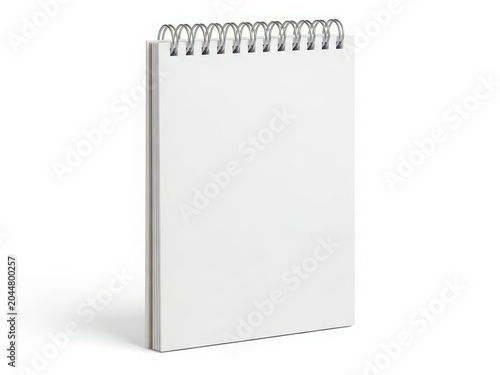 A blank spiral-bound notebook with a white cover standing upright.