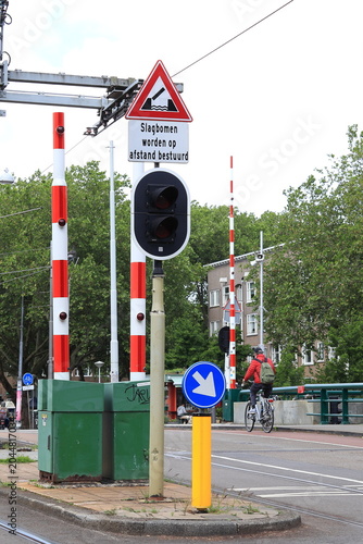 Amsterdam Street View with Wiegbrug Bridge Traffic Barriers, Netherlands
